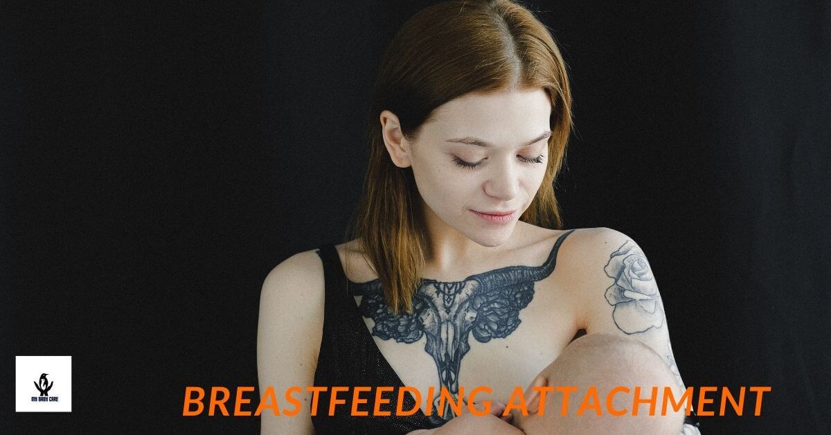 Adorable baby attached with mom for breastfeeding