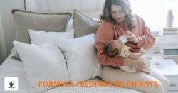 mother bottle feed her adorable daughter
